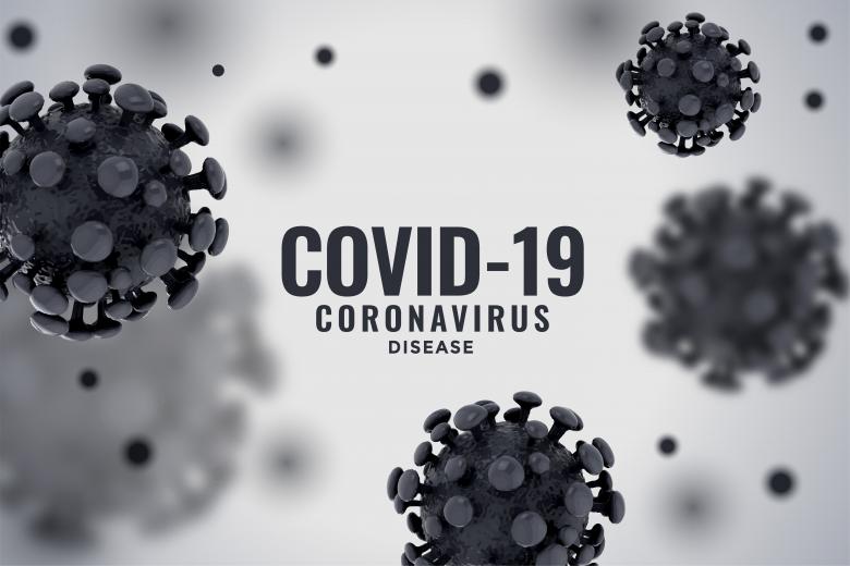 zdjęcie komórek wirusa z napisem Covid-19