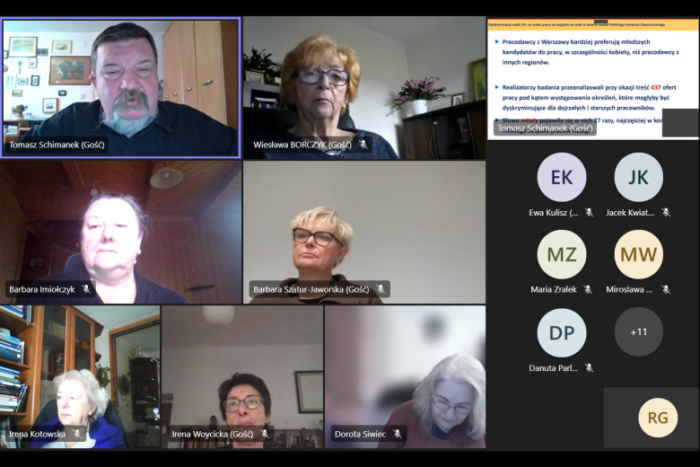 Zrzut ekranu z programu do prowadzenia konferencji online. Widać 7 uczestników spotkania, jeden z których prowadzi prezentację widoczną w prawym górnym rogu.