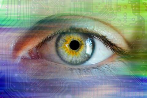 Abstrakcyjna ilustracja przedstawiająca oko obserwujące dane elektroniczne
