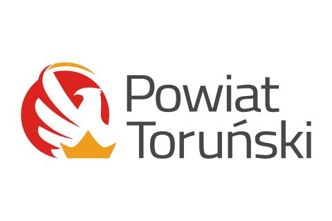 Stylizowany orzeł z tekstem Powiat Toruński